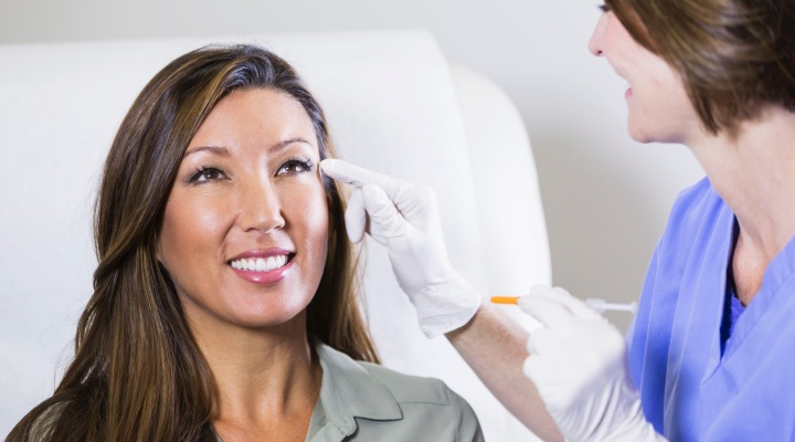 woman getting cosmetic consultation